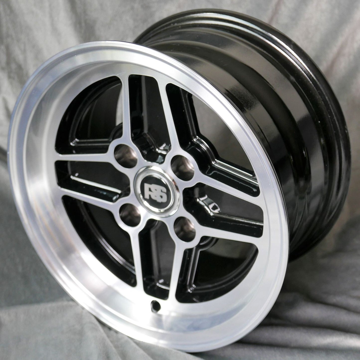 Set: 4x RS Style 7x13 schwarz/glanzgedreht + KM1 Hutmuttern 7/16" UNF